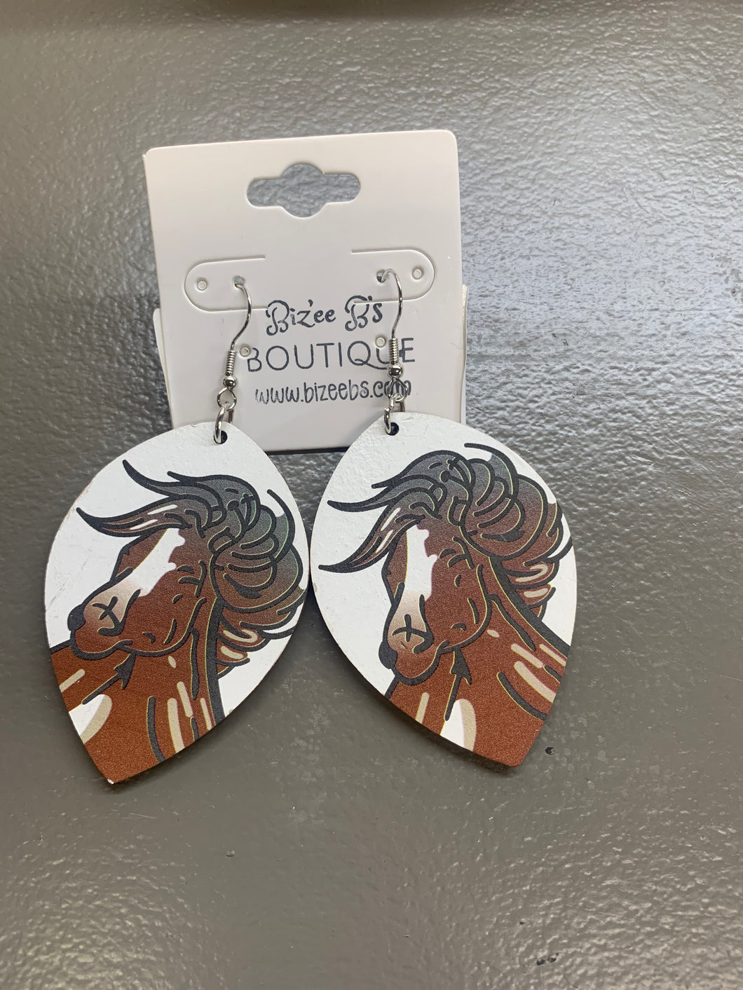 Oval horse earrings